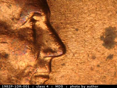 Die-stage B marker on 1982P•1DR•001 (1982 Doubled Die Reverse).