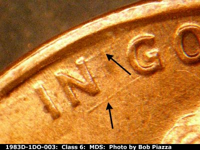 Die-stage B marker on 1983D•1DO•003 (1983 Doubled Die Obverse).