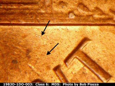 Die-stage B marker on 1983D•1DO•003 (1983 Doubled Die Obverse).