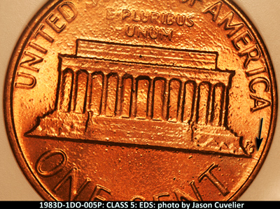Die-stage A marker on 1983D•1DO•005 (1983 Doubled Die Obverse).