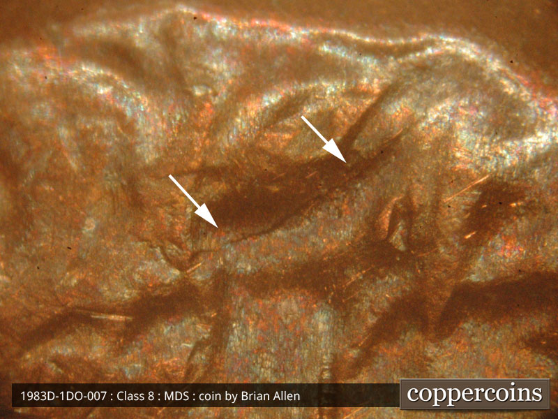 Die-stage B marker on 1983D•1DO•007 (1983 Doubled Die Obverse).