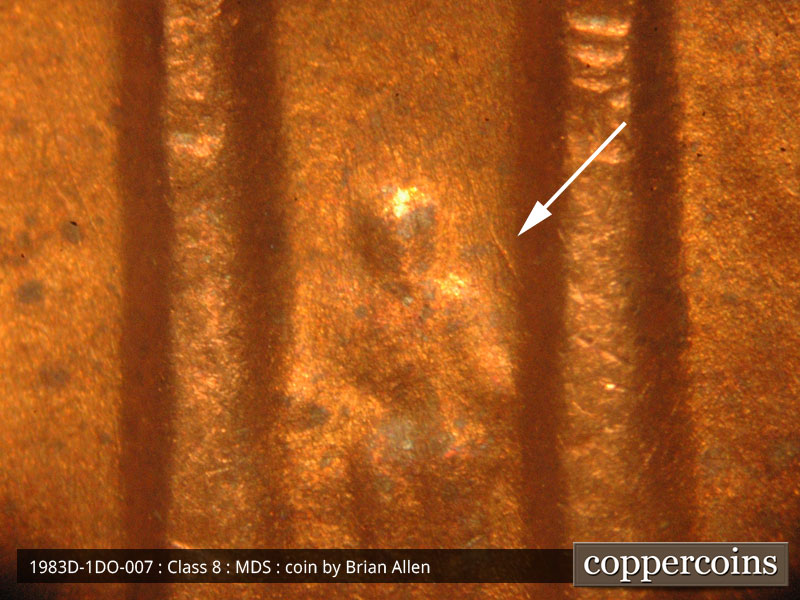 Die-stage B marker on 1983D•1DO•007 (1983 Doubled Die Obverse).