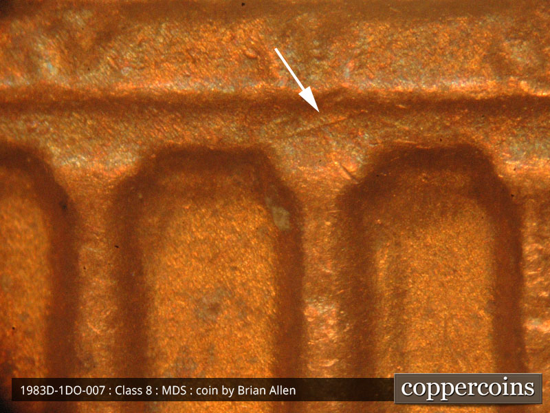 Die-stage B marker on 1983D•1DO•007 (1983 Doubled Die Obverse).
