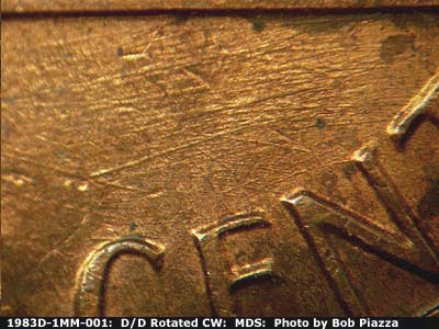 Die-stage B marker on 1983D•1MM•001 (1983 Repunched Mint Mark).