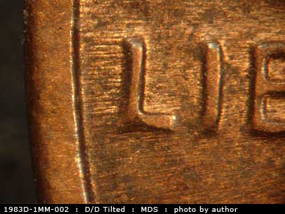 Die-stage B marker on 1983D•1MM•002 (1983 Repunched Mint Mark).