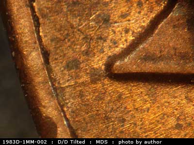 Die-stage B marker on 1983D•1MM•002 (1983 Repunched Mint Mark).