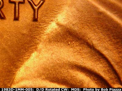 Die-stage B marker on 1983D•1MM•005 (1983 Repunched Mint Mark).