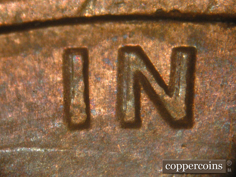 Die-stage B marker on 1983P•1DO•001 (1983 Doubled Die Obverse).