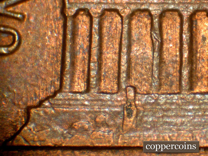 Die-stage B marker on 1983P•1DO•001 (1983 Doubled Die Obverse).
