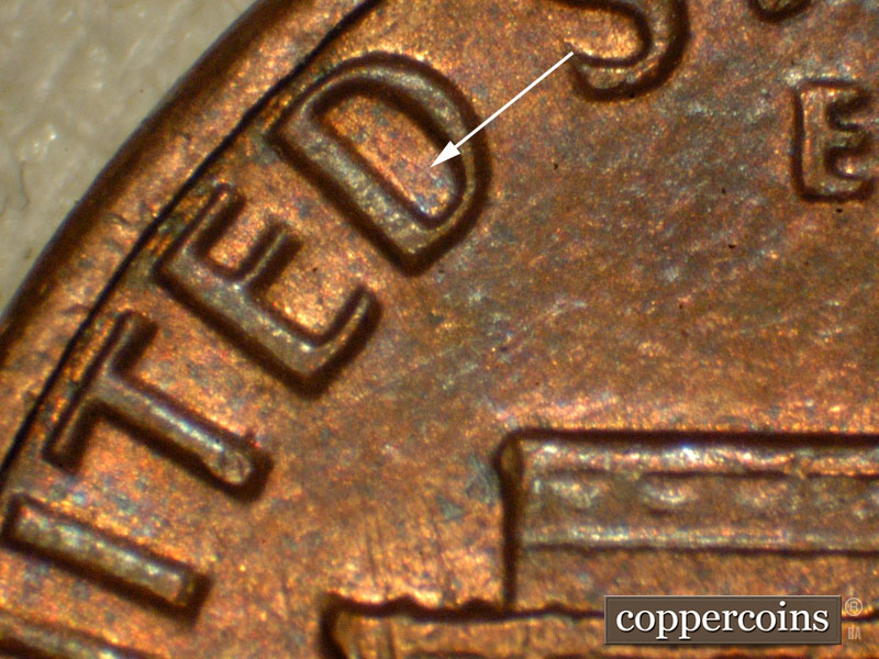 Die-stage B marker on 1983P•1DO•001 (1983 Doubled Die Obverse).