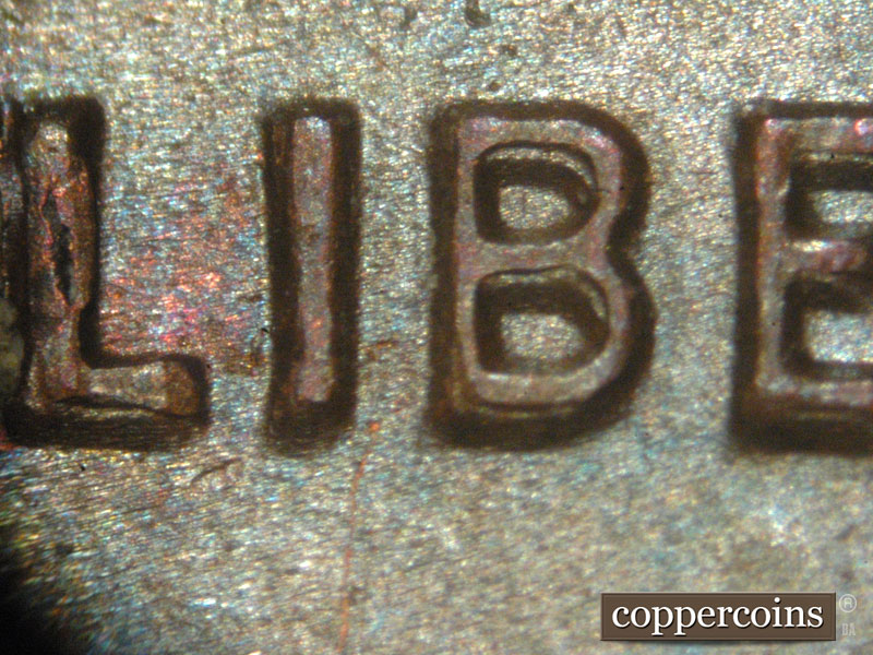Die-stage A marker on 1983P•1DO•001 (1983 Doubled Die Obverse).