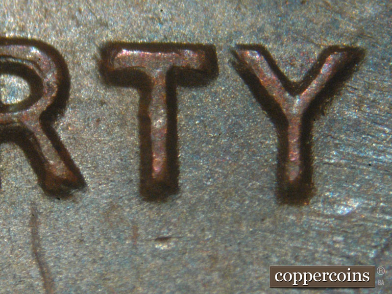 Die-stage A marker on 1983P•1DO•001 (1983 Doubled Die Obverse).