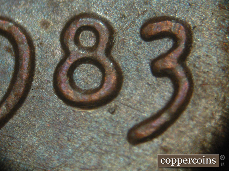 Die-stage A marker on 1983P•1DO•001 (1983 Doubled Die Obverse).