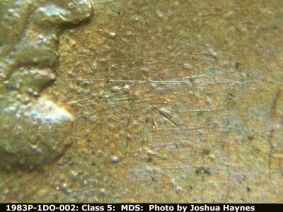 Die-stage B marker on 1983P•1DO•002 (1983 Doubled Die Obverse).