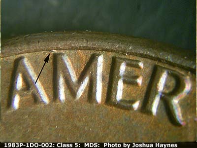 Die-stage B marker on 1983P•1DO•002 (1983 Doubled Die Obverse).