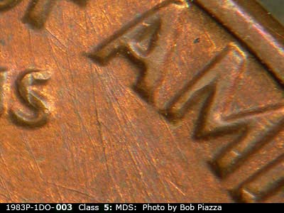 Die-stage B marker on 1983P•1DO•003 (1983 Doubled Die Obverse).