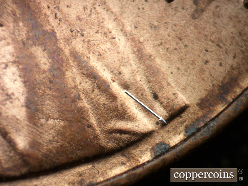 Die-stage B marker on 1983P•1DO•004 (1983 Doubled Die Obverse).