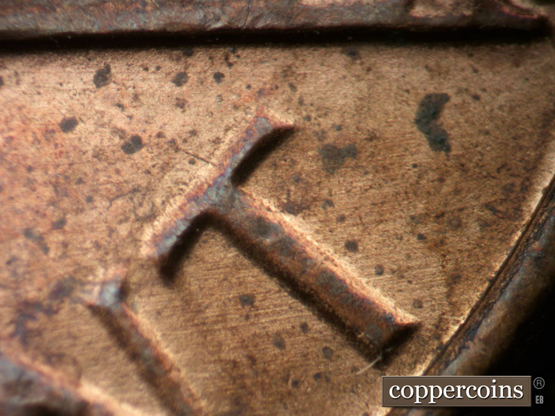 Die-stage B marker on 1983P•1DO•004 (1983 Doubled Die Obverse).