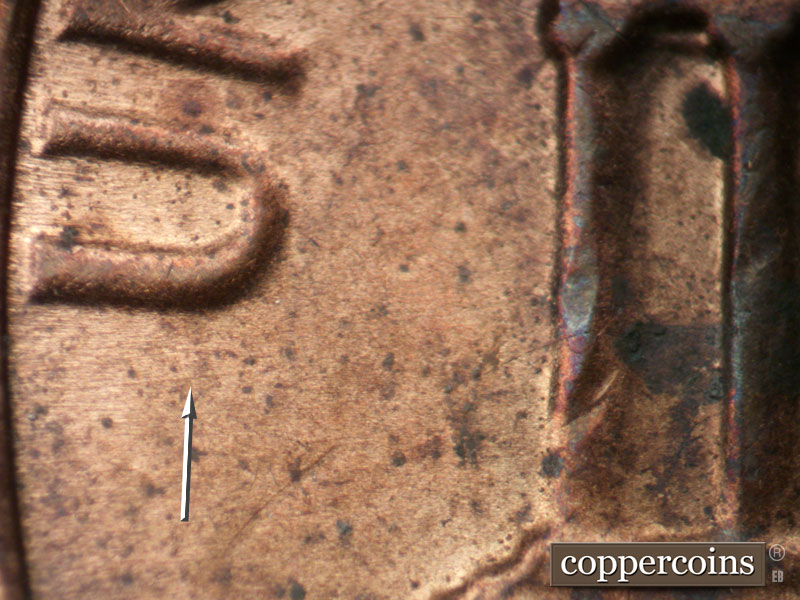 Die-stage B marker on 1983P•1DO•004 (1983 Doubled Die Obverse).
