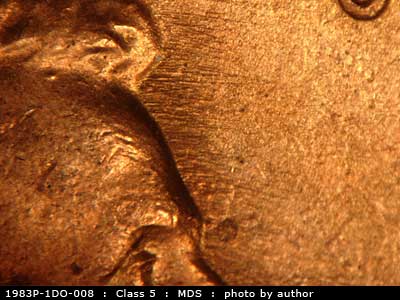 Die-stage B marker on 1983P•1DO•008 (1983 Doubled Die Obverse).