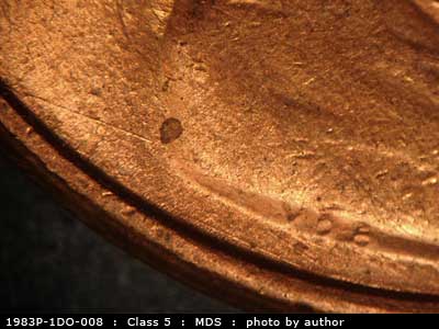 Die-stage B marker on 1983P•1DO•008 (1983 Doubled Die Obverse).
