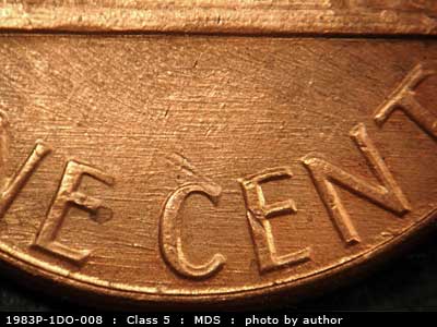 Die-stage B marker on 1983P•1DO•008 (1983 Doubled Die Obverse).