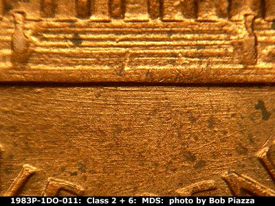 Die-stage B marker on 1983P•1DO•011 (1983 Doubled Die Obverse).