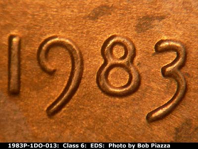 Die-stage A marker on 1983P•1DO•013 (1983 Doubled Die Obverse).