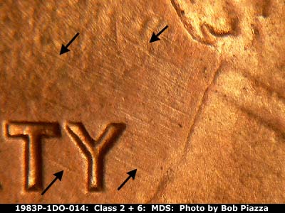Die-stage B marker on 1983P•1DO•014 (1983 Doubled Die Obverse).