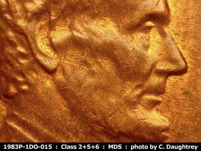 Die-stage B marker on 1983P•1DO•015 (1983 Doubled Die Obverse).