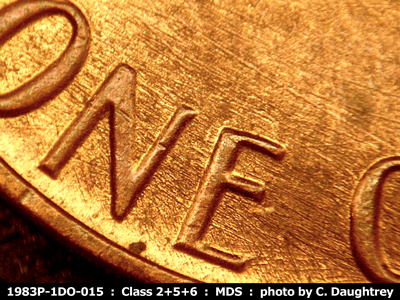 Die-stage B marker on 1983P•1DO•015 (1983 Doubled Die Obverse).