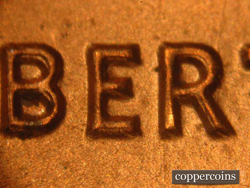 Die-stage B marker on 1983P•1DO•017 (1983 Doubled Die Obverse).