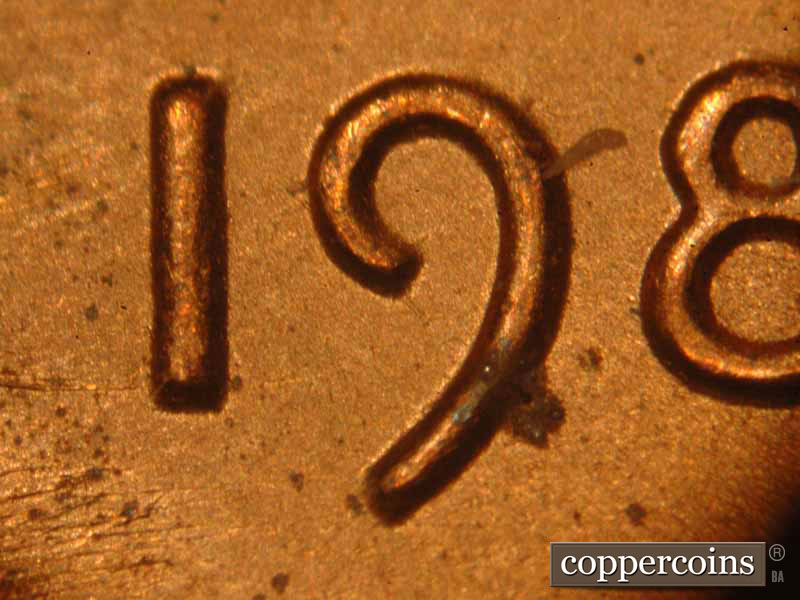 Die-stage B marker on 1983P•1DO•017 (1983 Doubled Die Obverse).