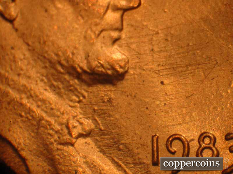 Die-stage B marker on 1983P•1DO•017 (1983 Doubled Die Obverse).
