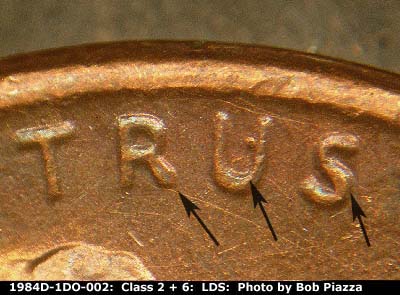 Die-stage C marker on 1984D•1DO•002 showing Doubling on TRUST.