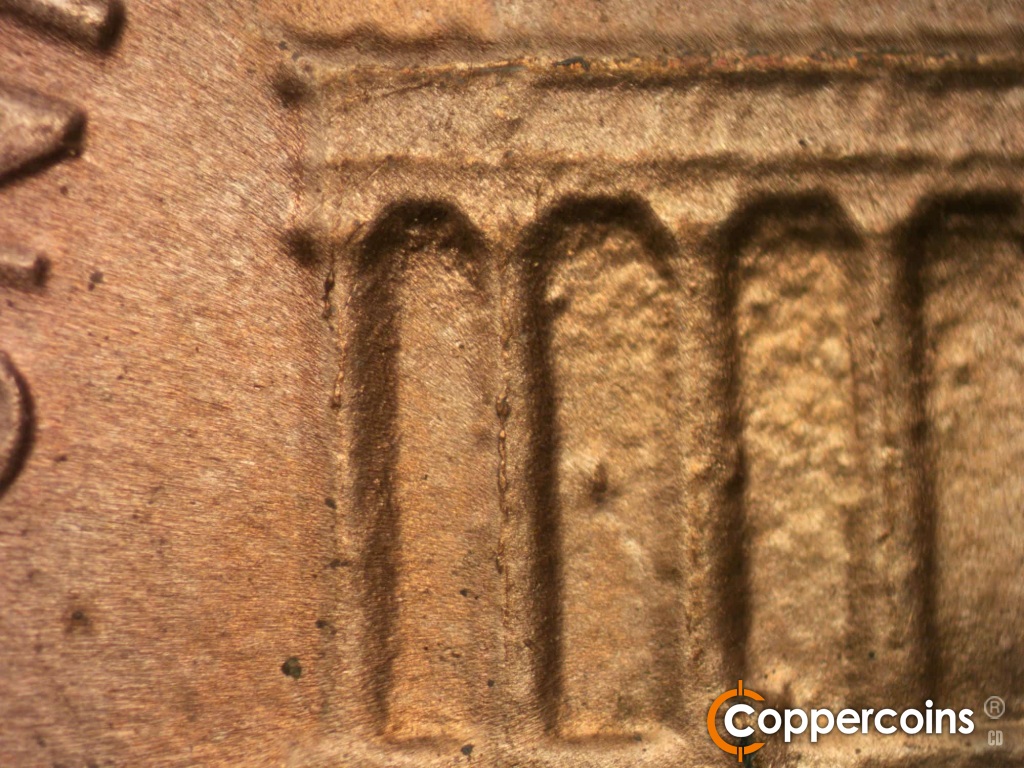 Die-stage B marker on 1984D•1DO•002 showing Die chipping on column 1 and 2.