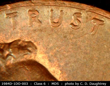 Die-stage B marker on 1984D•1DO•003 (1984 Doubled Die Obverse).