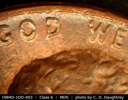 Die-stage B marker on 1984D•1DO•003 (1984 Doubled Die Obverse).