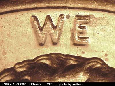 Die-stage B marker on 1984P•1DO•002 (1984 Doubled Die Obverse).