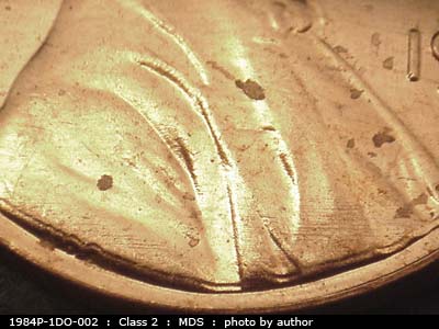 Die-stage B marker on 1984P•1DO•002 (1984 Doubled Die Obverse).
