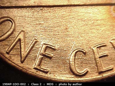 Die-stage B marker on 1984P•1DO•002 (1984 Doubled Die Obverse).