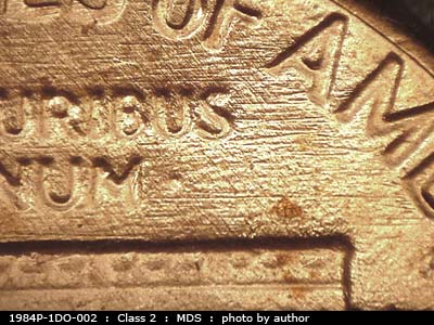 Die-stage B marker on 1984P•1DO•002 (1984 Doubled Die Obverse).