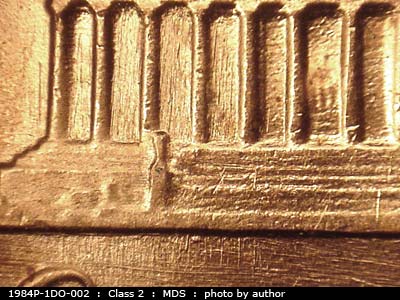 Die-stage B marker on 1984P•1DO•002 (1984 Doubled Die Obverse).