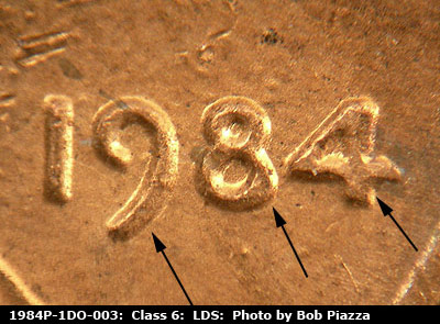 Die-stage C marker on 1984P•1DO•003 (1984 Doubled Die Obverse).