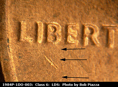 Die-stage C marker on 1984P•1DO•003 (1984 Doubled Die Obverse).