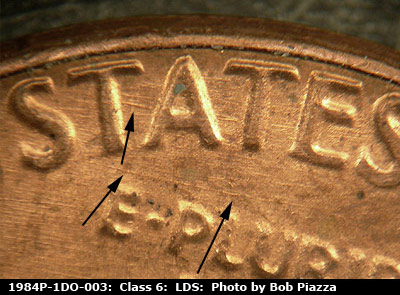 Die-stage C marker on 1984P•1DO•003 (1984 Doubled Die Obverse).