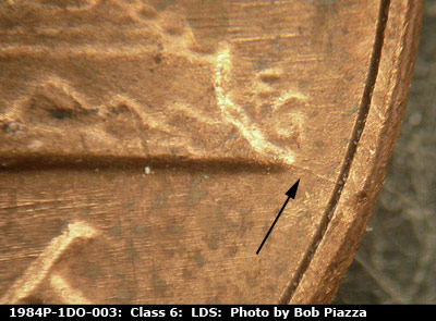 Die-stage C marker on 1984P•1DO•003 (1984 Doubled Die Obverse).