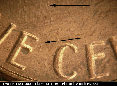 Die-stage C marker on 1984P•1DO•003 (1984 Doubled Die Obverse).