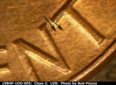Die-stage C marker on 1984P•1DO•005 (1984 Doubled Die Obverse).