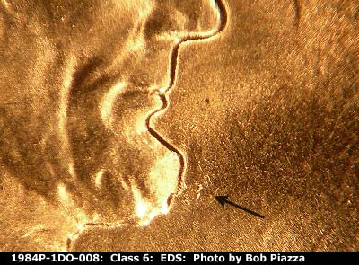 Die-stage A marker on 1984P•1DO•008 (1984 Doubled Die Obverse).